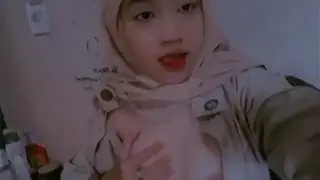 Bokep Indo Remaja Hijab Seragam SMP Main Lembut poster