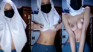 Nina Asanti Jilbab Seragam Batik Aksi Ranjang poster
